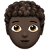 🧑🏿‍🦱 person: dark skin tone, curly hair display on Apple